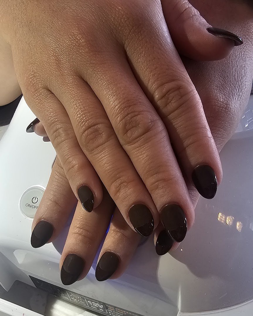 Neat manicure station with polish bottles.